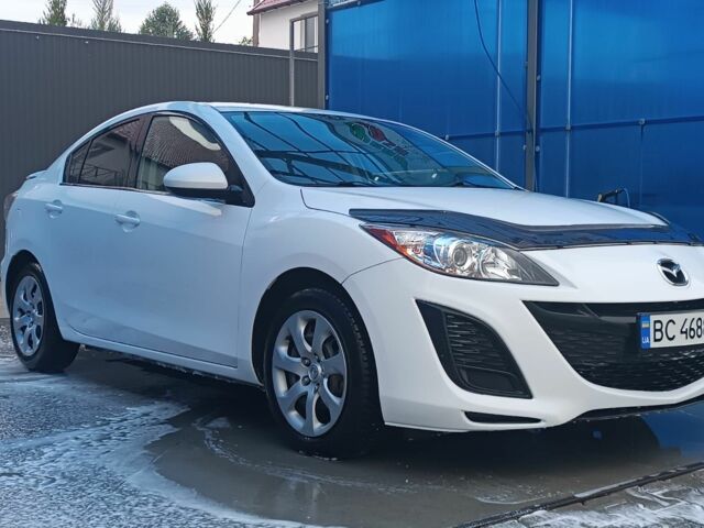 Белый Мазда 3, объемом двигателя 2 л и пробегом 137 тыс. км за 6499 $, фото 4 на Automoto.ua