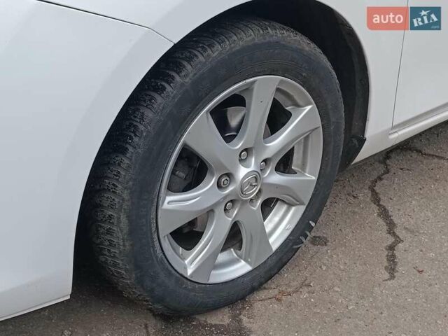 Білий Мазда 3, об'ємом двигуна 1.6 л та пробігом 130 тис. км за 7790 $, фото 4 на Automoto.ua