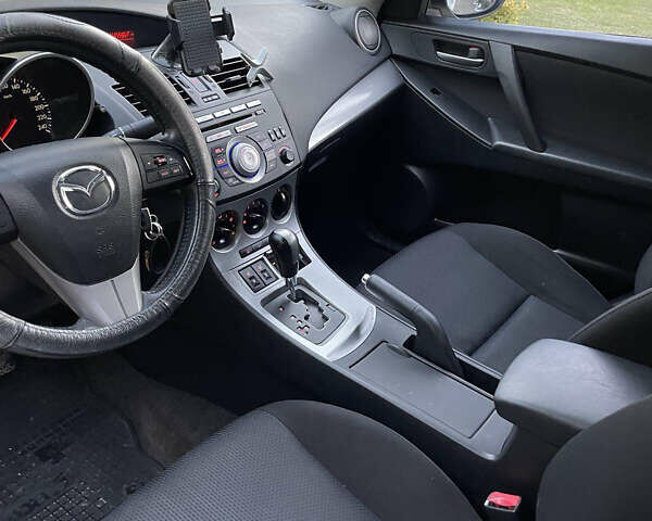 Мазда 3 2010 в Самборе на Automoto.ua Белый Мазда 3, объемом двигателя 1.6 л и пробегом 132 тыс. км за 7200 $, фото 6 на Automoto.ua