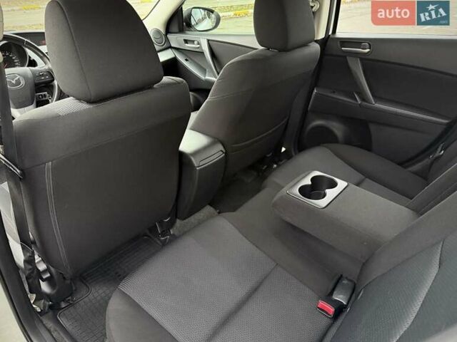 Білий Мазда 3, об'ємом двигуна 1.6 л та пробігом 170 тис. км за 9200 $, фото 18 на Automoto.ua