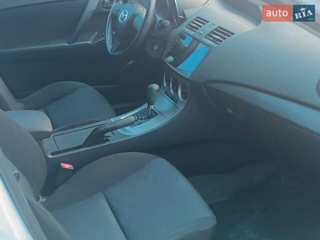 Белый Мазда 3, объемом двигателя 2 л и пробегом 137 тыс. км за 6500 $, фото 11 на Automoto.ua