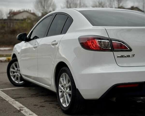 Білий Мазда 3, об'ємом двигуна 1.6 л та пробігом 170 тис. км за 9200 $, фото 14 на Automoto.ua