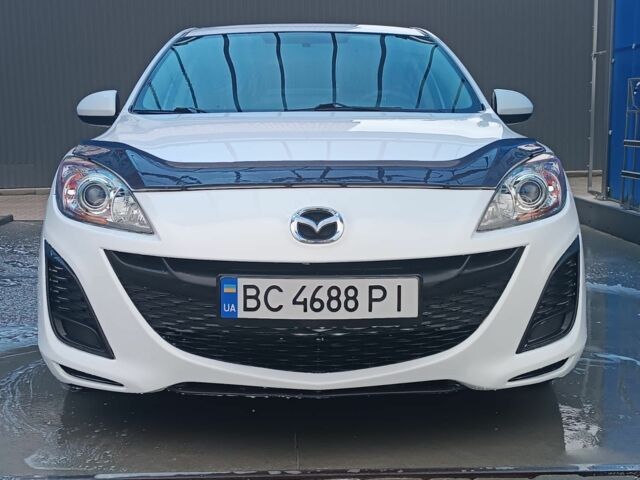 Белый Мазда 3, объемом двигателя 2 л и пробегом 137 тыс. км за 6499 $, фото 2 на Automoto.ua