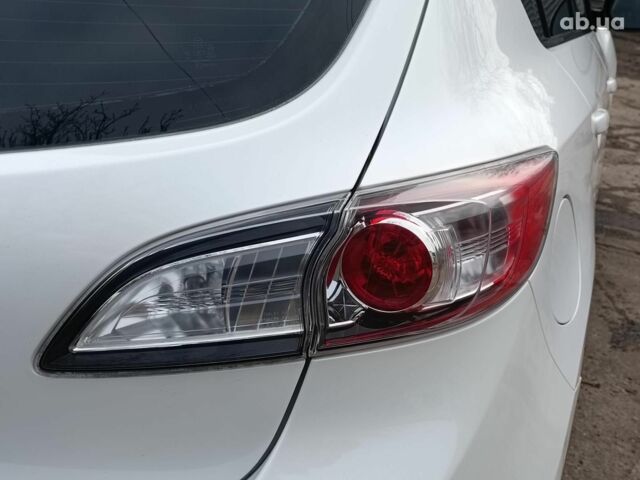 Білий Мазда 3, об'ємом двигуна 1.6 л та пробігом 130 тис. км за 7790 $, фото 11 на Automoto.ua