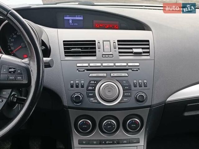 Білий Мазда 3, об'ємом двигуна 1.6 л та пробігом 130 тис. км за 7790 $, фото 15 на Automoto.ua