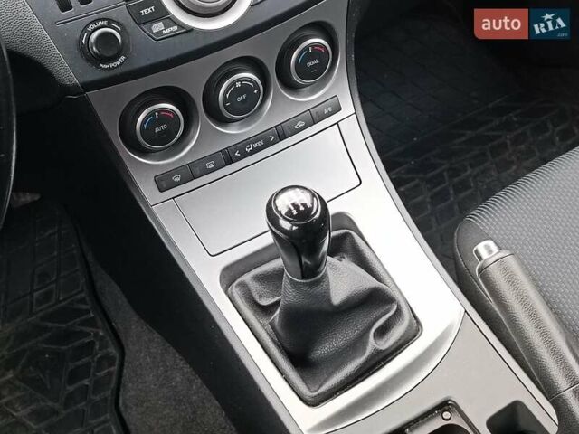 Білий Мазда 3, об'ємом двигуна 1.6 л та пробігом 130 тис. км за 7790 $, фото 16 на Automoto.ua