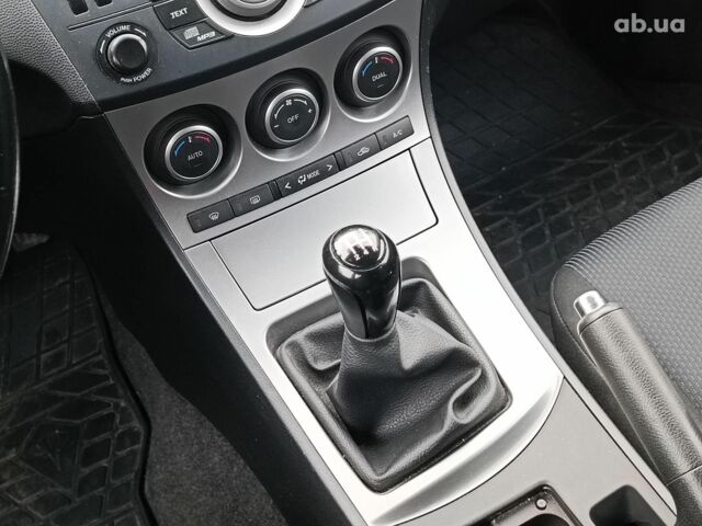 Білий Мазда 3, об'ємом двигуна 1.6 л та пробігом 130 тис. км за 7790 $, фото 16 на Automoto.ua