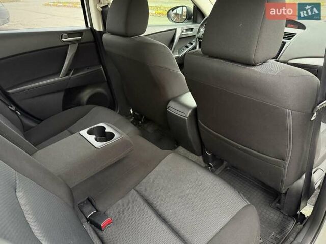 Білий Мазда 3, об'ємом двигуна 1.6 л та пробігом 170 тис. км за 9200 $, фото 19 на Automoto.ua