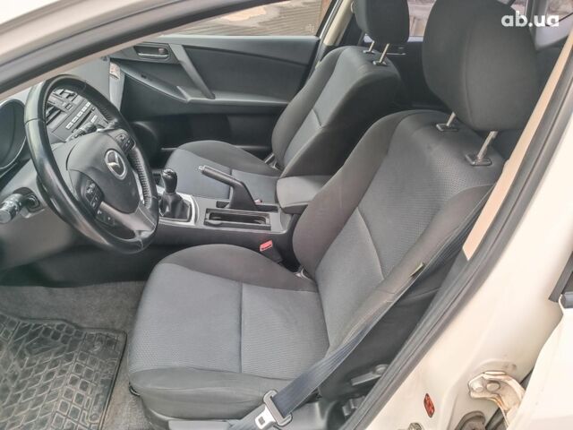 Білий Мазда 3, об'ємом двигуна 1.6 л та пробігом 130 тис. км за 7790 $, фото 19 на Automoto.ua