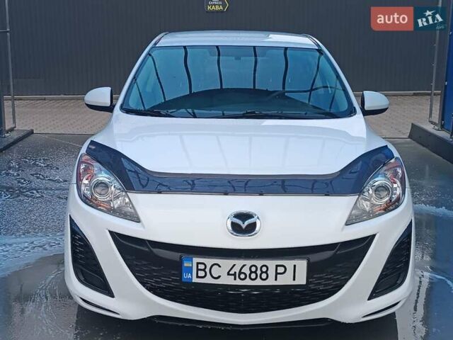 Белый Мазда 3, объемом двигателя 2 л и пробегом 137 тыс. км за 6500 $, фото 2 на Automoto.ua