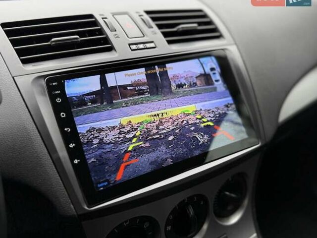 Білий Мазда 3, об'ємом двигуна 1.6 л та пробігом 170 тис. км за 9200 $, фото 24 на Automoto.ua