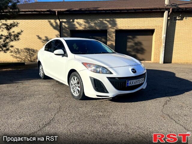 Білий Мазда 3, об'ємом двигуна 2 л та пробігом 140 тис. км за 6550 $, фото 3 на Automoto.ua