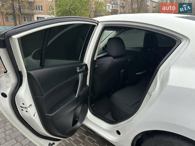 Белый Мазда 3, объемом двигателя 2.5 л и пробегом 187 тыс. км за 8500 $, фото 24 на Automoto.ua