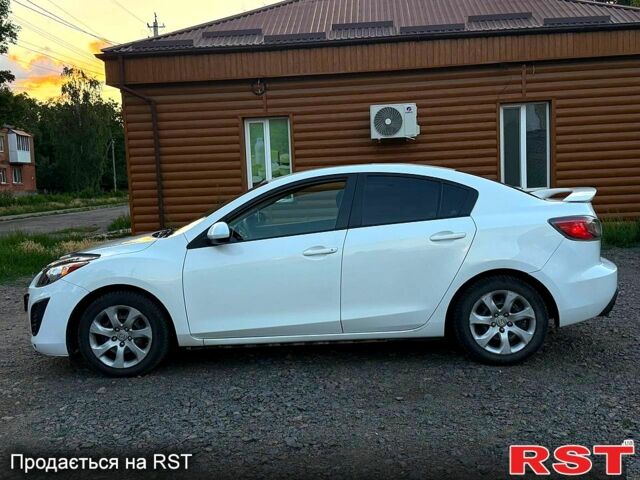 Белый Мазда 3, объемом двигателя 2 л и пробегом 140 тыс. км за 7800 $, фото 4 на Automoto.ua