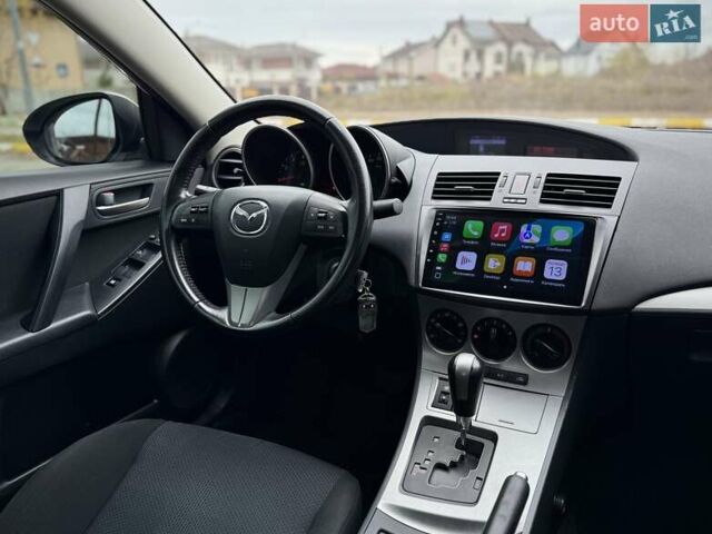 Білий Мазда 3, об'ємом двигуна 1.6 л та пробігом 170 тис. км за 9200 $, фото 21 на Automoto.ua