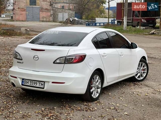 Белый Мазда 3, объемом двигателя 2 л и пробегом 200 тыс. км за 7900 $, фото 5 на Automoto.ua