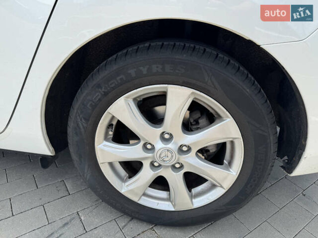 Белый Мазда 3, объемом двигателя 1.6 л и пробегом 180 тыс. км за 9350 $, фото 31 на Automoto.ua