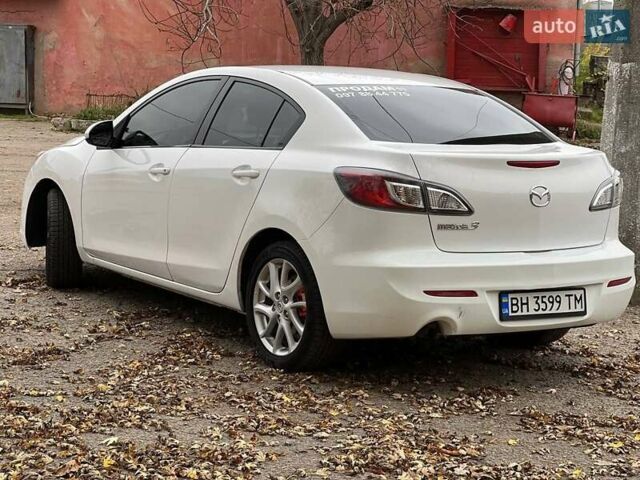 Белый Мазда 3, объемом двигателя 2 л и пробегом 200 тыс. км за 7900 $, фото 6 на Automoto.ua