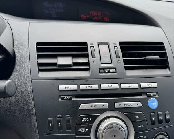 Белый Мазда 3, объемом двигателя 1.6 л и пробегом 180 тыс. км за 9350 $, фото 61 на Automoto.ua