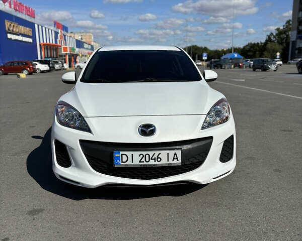 Белый Мазда 3, объемом двигателя 2 л и пробегом 155 тыс. км за 8500 $, фото 1 на Automoto.ua
