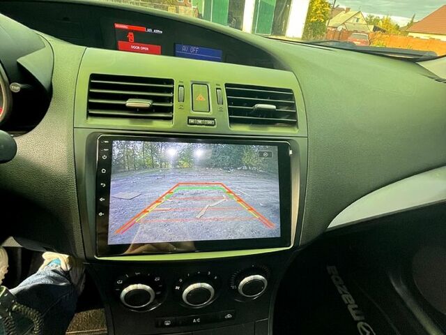 Белый Мазда 3, объемом двигателя 2 л и пробегом 200 тыс. км за 7500 $, фото 6 на Automoto.ua