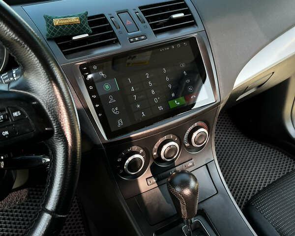 Белый Мазда 3, объемом двигателя 2 л и пробегом 247 тыс. км за 8500 $, фото 12 на Automoto.ua