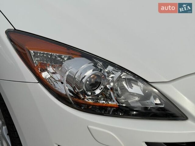 Білий Мазда 3, об'ємом двигуна 1.6 л та пробігом 40 тис. км за 9200 $, фото 11 на Automoto.ua
