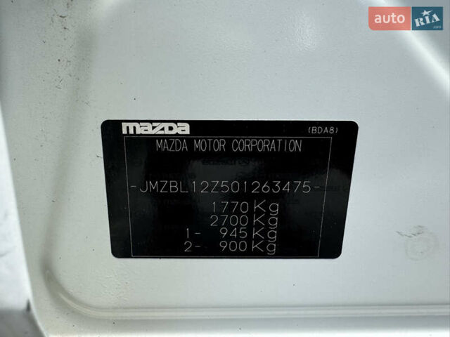 Белый Мазда 3, объемом двигателя 1.6 л и пробегом 180 тыс. км за 9350 $, фото 59 на Automoto.ua