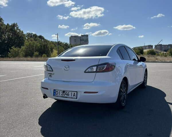 Белый Мазда 3, объемом двигателя 2 л и пробегом 155 тыс. км за 8500 $, фото 4 на Automoto.ua