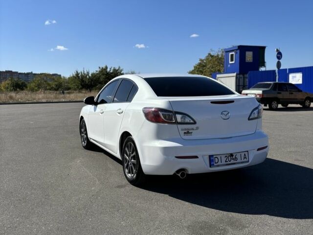 Белый Мазда 3, объемом двигателя 2 л и пробегом 155 тыс. км за 8500 $, фото 2 на Automoto.ua