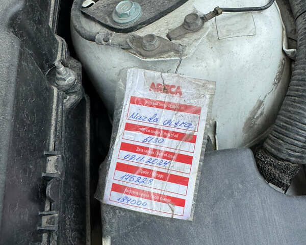 Белый Мазда 3, объемом двигателя 1.6 л и пробегом 180 тыс. км за 9350 $, фото 74 на Automoto.ua