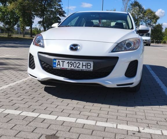 Білий Мазда 3, об'ємом двигуна 2 л та пробігом 256 тис. км за 7326 $, фото 1 на Automoto.ua