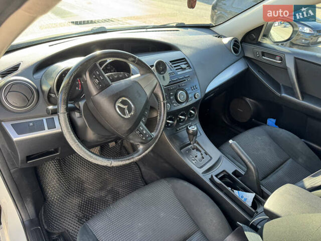 Білий Мазда 3, об'ємом двигуна 2 л та пробігом 208 тис. км за 8300 $, фото 17 на Automoto.ua