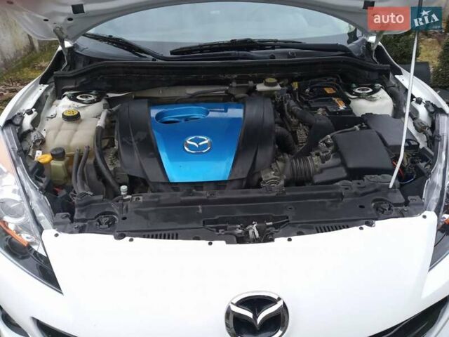 Белый Мазда 3, объемом двигателя 2 л и пробегом 252 тыс. км за 8300 $, фото 17 на Automoto.ua