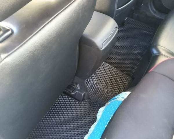 Белый Мазда 3, объемом двигателя 2 л и пробегом 252 тыс. км за 8300 $, фото 7 на Automoto.ua