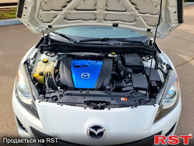 Белый Мазда 3, объемом двигателя 2 л и пробегом 163 тыс. км за 9400 $, фото 13 на Automoto.ua