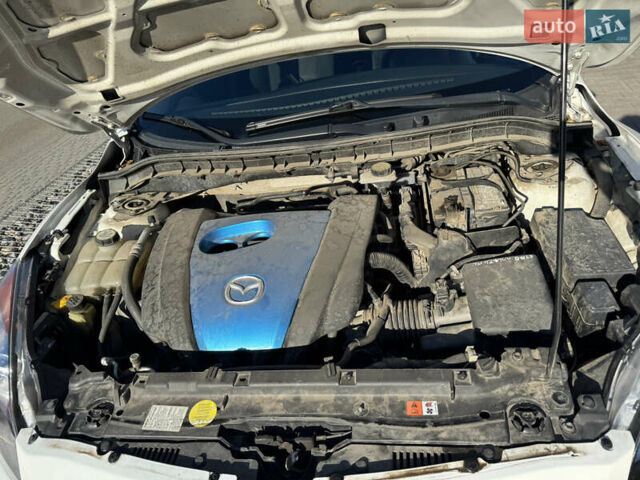 Білий Мазда 3, об'ємом двигуна 2 л та пробігом 208 тис. км за 8300 $, фото 19 на Automoto.ua