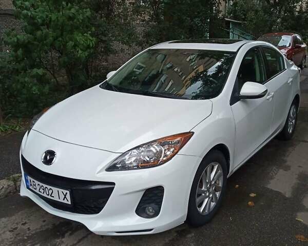 Белый Мазда 3, объемом двигателя 2 л и пробегом 252 тыс. км за 8300 $, фото 1 на Automoto.ua