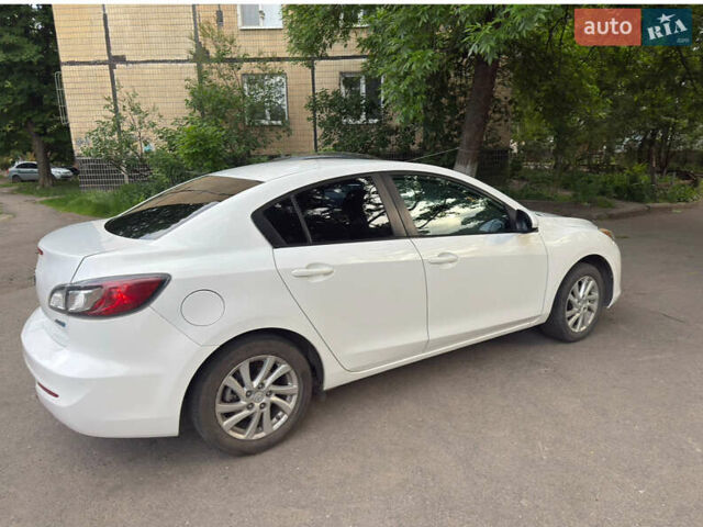 Белый Мазда 3, объемом двигателя 2 л и пробегом 182 тыс. км за 8300 $, фото 1 на Automoto.ua