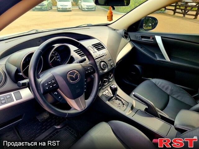 Белый Мазда 3, объемом двигателя 2 л и пробегом 163 тыс. км за 9400 $, фото 9 на Automoto.ua