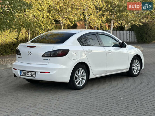 Белый Мазда 3, объемом двигателя 2 л и пробегом 165 тыс. км за 8000 $, фото 15 на Automoto.ua
