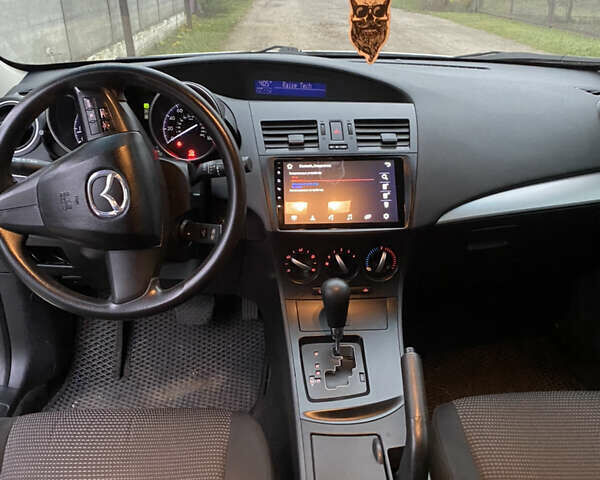 Белый Мазда 3, объемом двигателя 2 л и пробегом 158 тыс. км за 7600 $, фото 7 на Automoto.ua