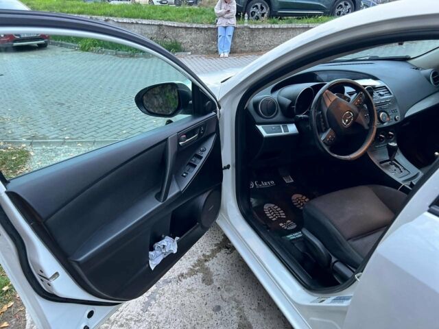 Білий Мазда 3, об'ємом двигуна 2 л та пробігом 208 тис. км за 7500 $, фото 11 на Automoto.ua