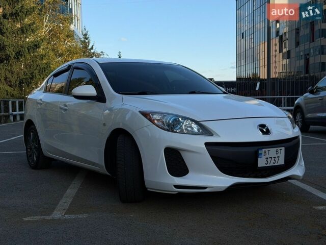 Белый Мазда 3, объемом двигателя 2 л и пробегом 153 тыс. км за 9000 $, фото 1 на Automoto.ua