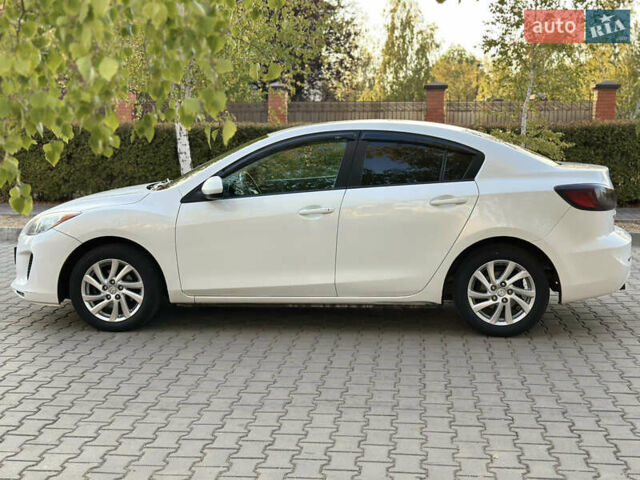 Белый Мазда 3, объемом двигателя 2 л и пробегом 165 тыс. км за 8000 $, фото 35 на Automoto.ua