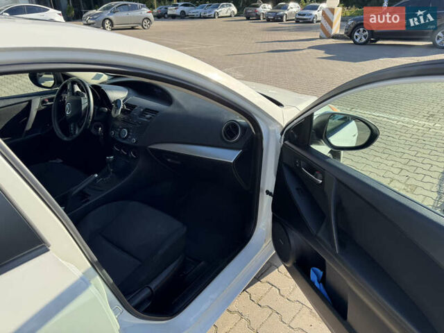 Білий Мазда 3, об'ємом двигуна 2 л та пробігом 208 тис. км за 8300 $, фото 15 на Automoto.ua