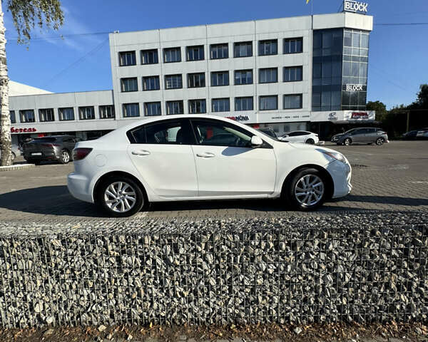 Білий Мазда 3, об'ємом двигуна 2 л та пробігом 208 тис. км за 8300 $, фото 4 на Automoto.ua