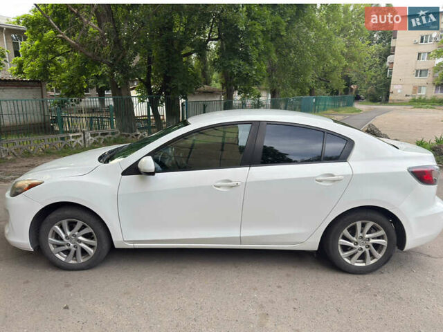 Белый Мазда 3, объемом двигателя 2 л и пробегом 182 тыс. км за 8300 $, фото 3 на Automoto.ua