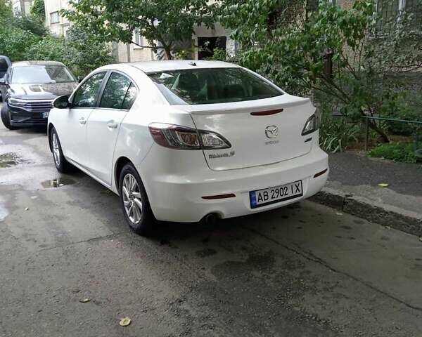 Белый Мазда 3, объемом двигателя 2 л и пробегом 252 тыс. км за 8300 $, фото 16 на Automoto.ua