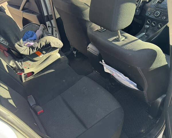 Білий Мазда 3, об'ємом двигуна 2 л та пробігом 208 тис. км за 8300 $, фото 12 на Automoto.ua